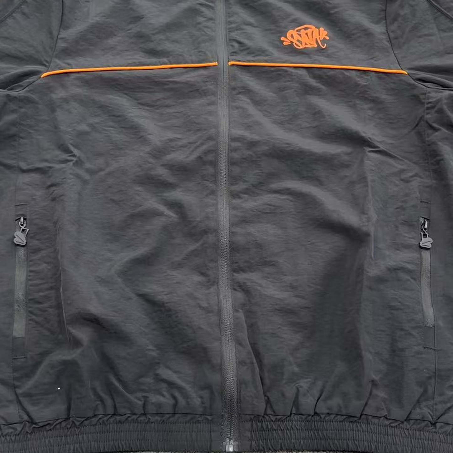 SYNA WORLD SHELL TRACKSUIT (BLACK/ORANGE)