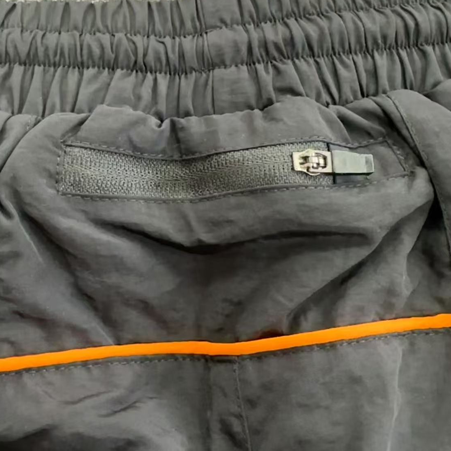 SYNA WORLD SHELL TRACKSUIT (BLACK/ORANGE)